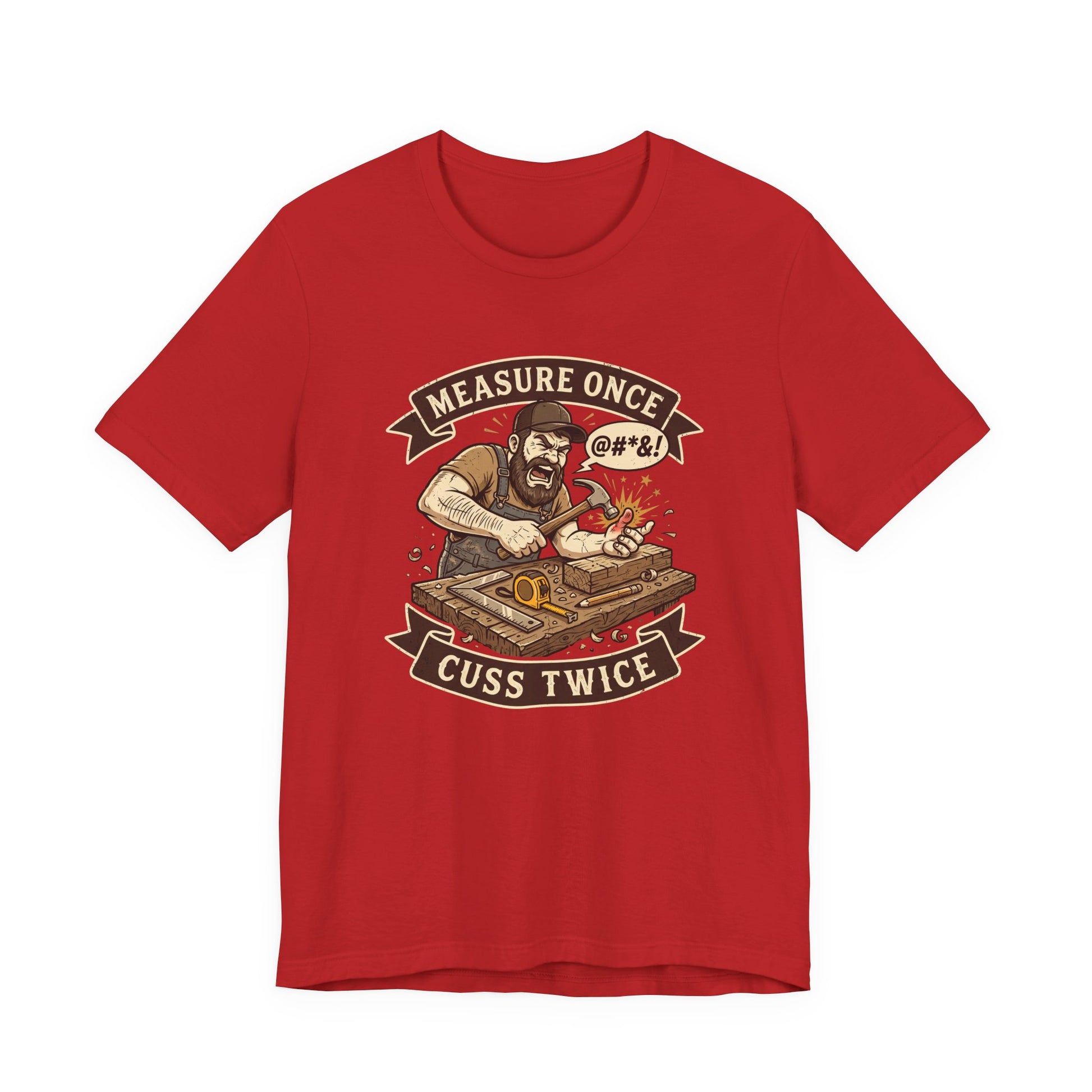 A red short-sleeve crewneck t-shirt featuring a vintage-style graphic of a bearded man measuring wood with a square and compass, surrounded by banners that read 'MEASURE ONCE' and 'CUSS TWICE'.