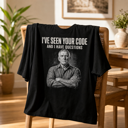 Man wearing I've Seen Your Code black programmer t-shirt Tee over the chair